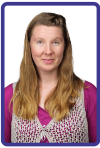 Rehabilitation Case Manager Paivi McDonald pictured in a face on professional photo of her head and shoulders, with long brown hair and wearing a purple long sleeve top and a silver cardigan.